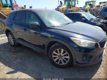  Salvage Mazda Cx