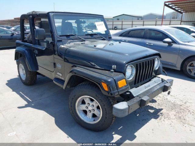  Salvage Jeep Wrangler